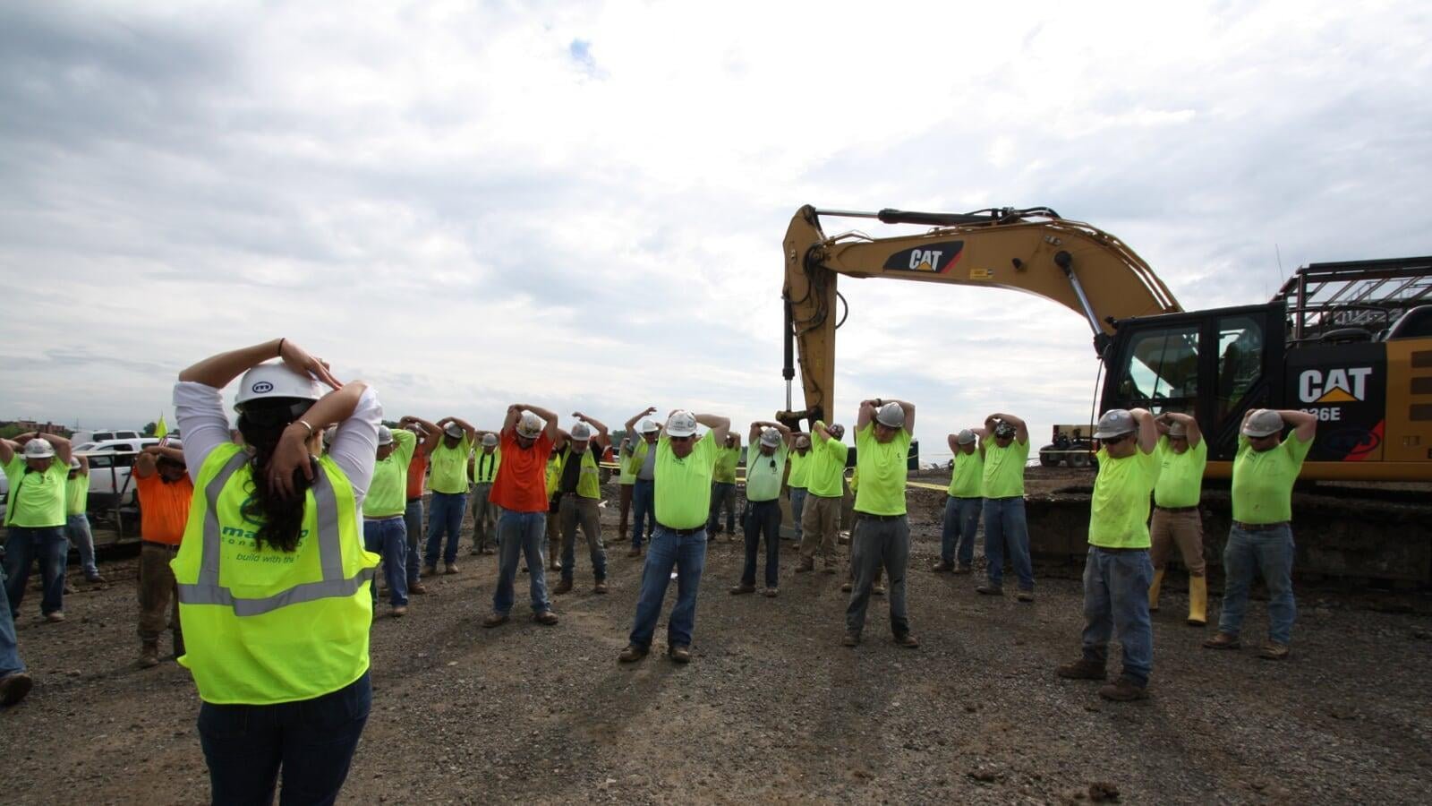 Mascaro Construction wellness program in progress, team stretching image